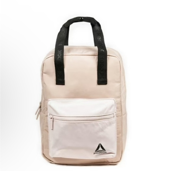 Reebok Handbags - NWOT Reebok Beige and White Mini Backpack